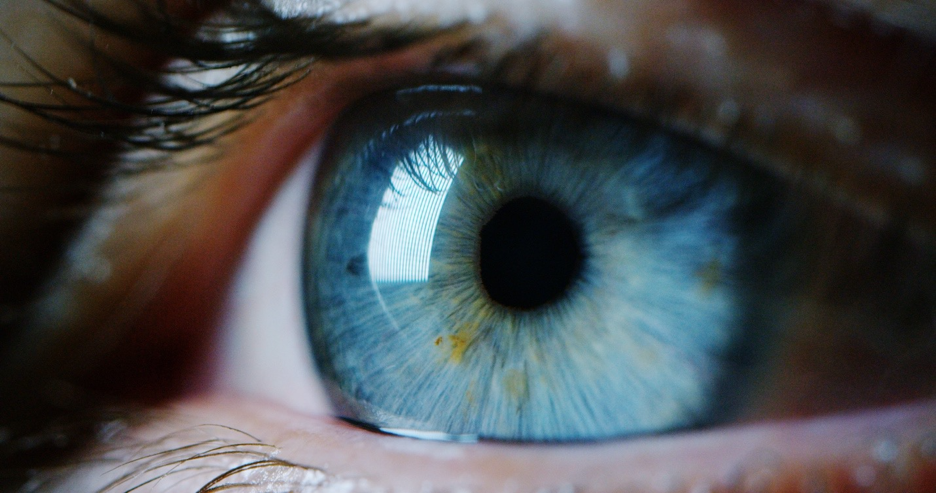 Close up of an eye with blue iris